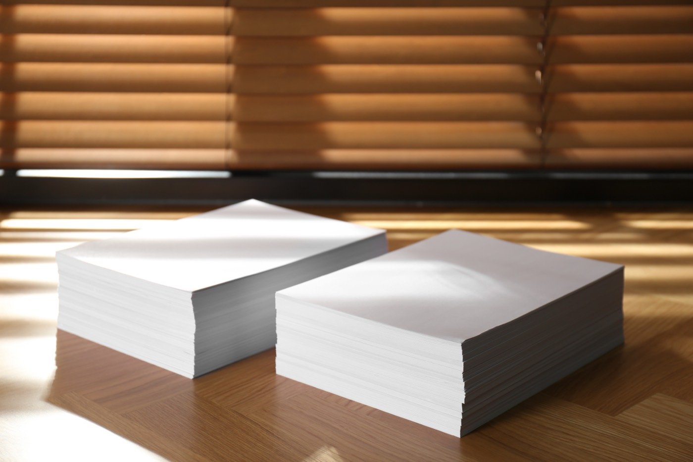 Stacks of office paper ready for daily print volume