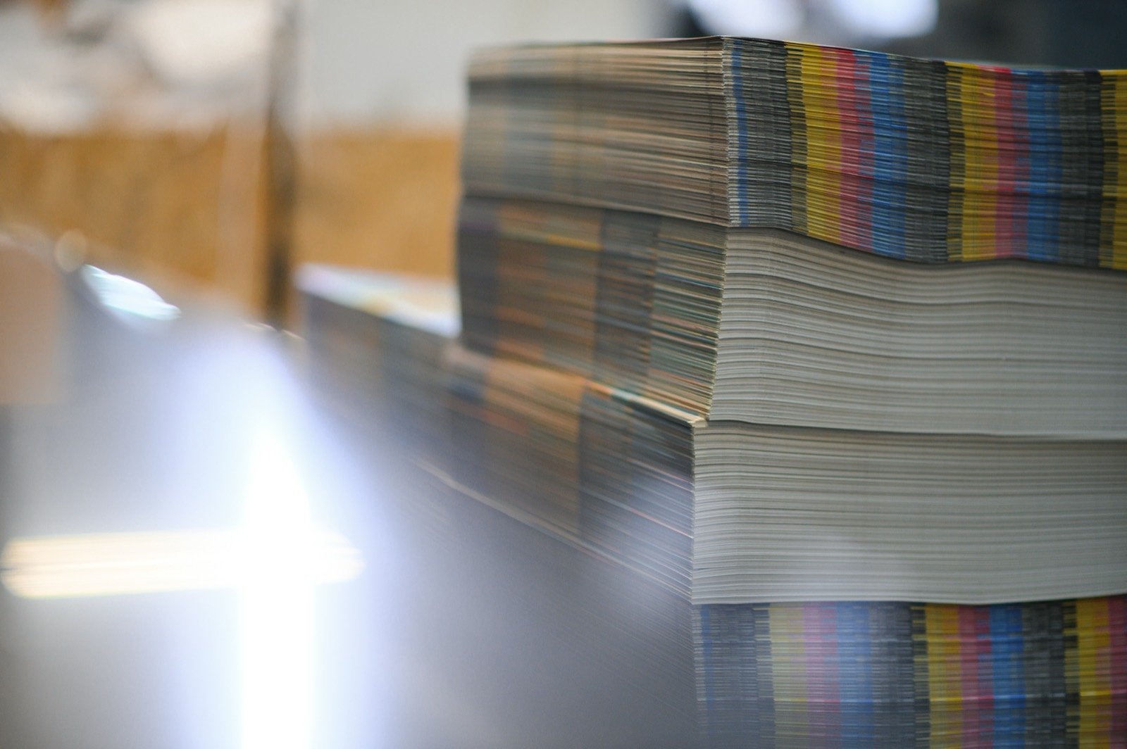 Stacked printed work with color bars on the trim